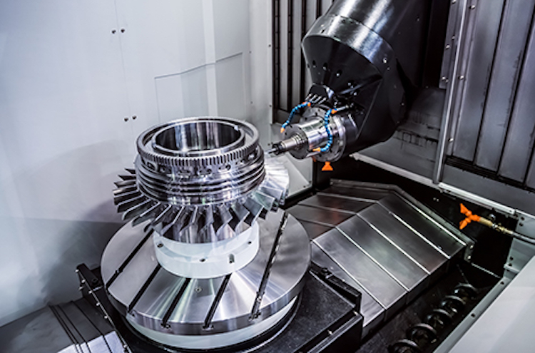 Metalworking CNC milling machine. Metalworking CNC milling machine. Cutting metal modern processing technology. Small depth of field. Warning - authentic shooting in challenging conditions. A little bit grain and maybe blurred.